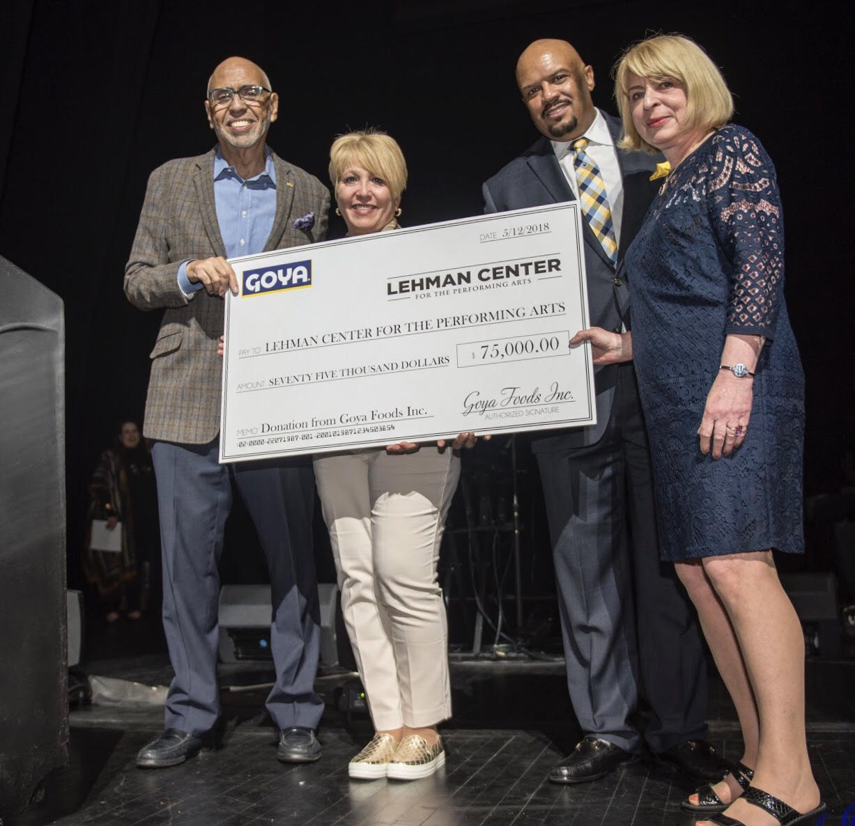 Press Release: GOYA FOODS PRESENTS $75,000 CHECK TO SUPPORT  THE LATINO CONCERT SERIES AT LEHMAN CENTER FOR THE PERFORMING ARTS AND DONATES 2,800 POUNDS OF FOOD TO FOOD PANTRY OF LEHMAN COLLEGE
